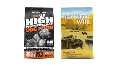 Bully Max 30/20 High Protein Dog Food bag beside Taste of the Wild High Prairie Canine Recipe bag