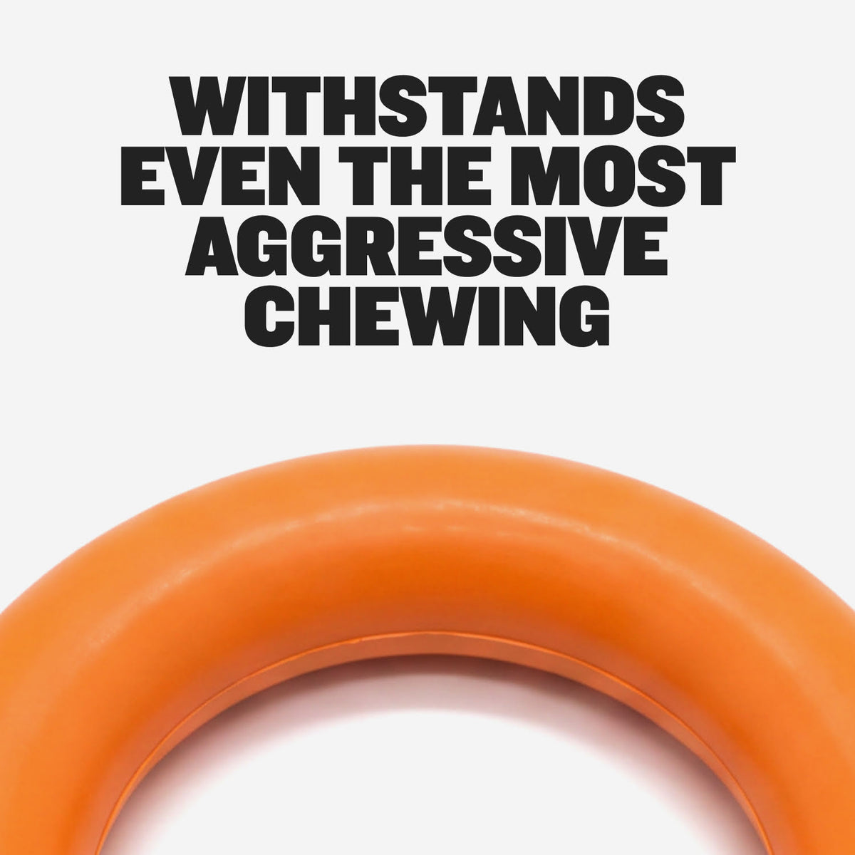 Close-up of the orange Bully Max chew ring. Text: withstands even the most aggressive chewing