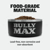 Heavy-Duty Steel Dog Bowls: black steel bowl filled with kibble. Text: food-grade material, lead-free, non-corrosive and non-absorbent